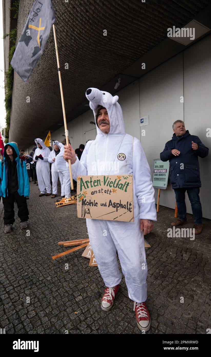 Berlin, Germany. 15th Apr, 2023. Extinction Rebellion protest Berlin 15 April 2023. Protesters, including members of Extinction Rebellion, marched from the Bayer AG Pharmaceuticals centre ( North East central Berlin) to the Federal Ministry of Food and Agriculture in central Berlin. Outside the Ministry a 'die in', of  protesters dressed as animals, took place and saw the arrival of the 'Red Rebel Brigade' from Extinction Rebellion. Berlin Germany. Credit: GaryRobertsphotography/Alamy Live News Stock Photo