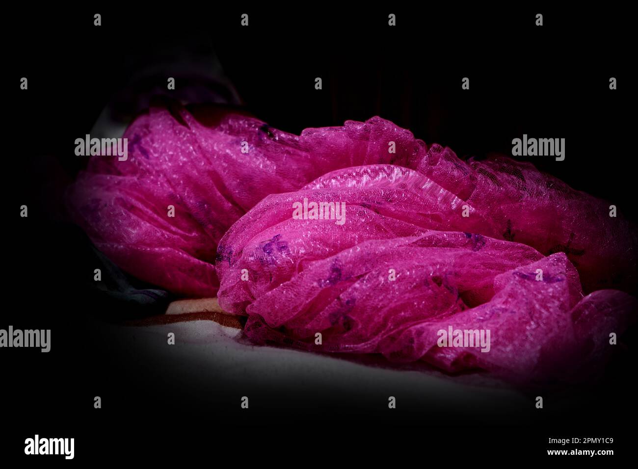 Beautiful monochromatic pink silk fabric Stock Photo