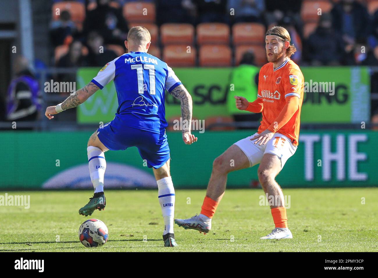 James McClean #11 of Wigan Athletic holds the ball as Josh Bowler #11 of Blackpool pressures during the Sky Bet Championship match Blackpool vs Wigan Athletic at Bloomfield Road, Blackpool, United Kingdom, James McClean #11 of Wigan Athletic holds the ball as Josh Bowler #11 of Blackpool pressures during the Sky Bet Championship match Blackpool vs Wigan Athletic at Bloomfield Road, Blackpool, United Kingdom,