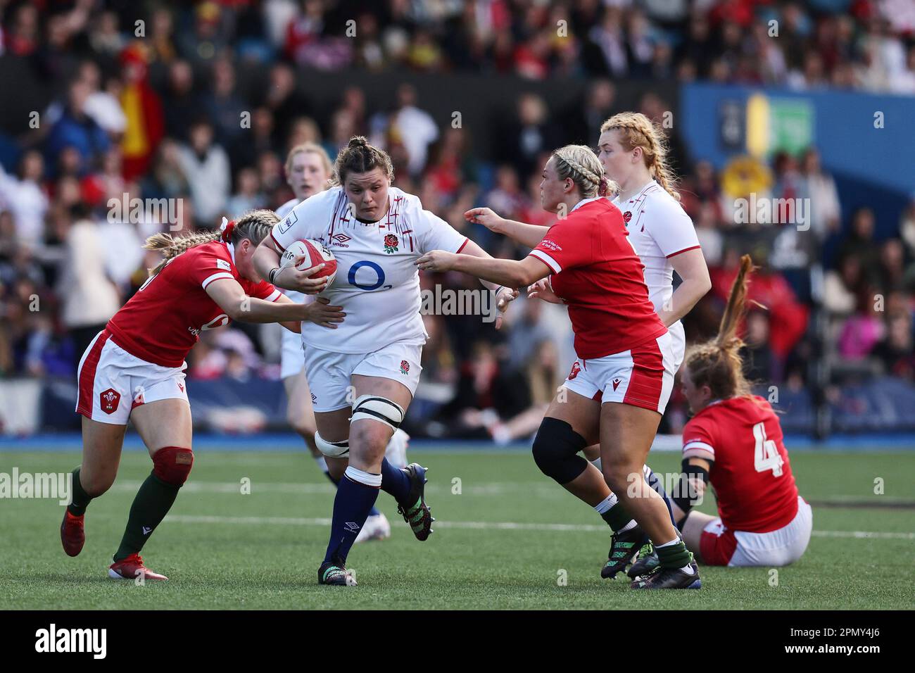 Cardiff, UK. 15th Apr, 2023. Sarah Beckett of England (c) is stopped by Hannah Jones (l) and Alex Callender of Wales (r). TikTok Women's Six Nations 2023 championship, Wales women v England women at Cardiff Arms Park in Cardiff, South Wales on Saturday 15th April 2023. pic by Andrew Orchard/Andrew Orchard sports photography/Alamy Live news Credit: Andrew Orchard sports photography/Alamy Live News Stock Photo