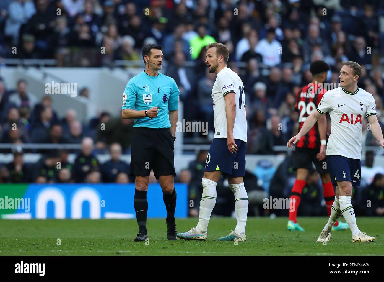Tottenham Hotspur Stadium, London, UK. 15th Apr, 2023. Premier League Football, Tottenham Hotspur versus Bournemouth; referee Andy Madley tells Harry Kane of Tottenham Hotspur as the penalty he wants is being reviewed by VAR. Credit: Action Plus Sports/Alamy Live News Stock Photo