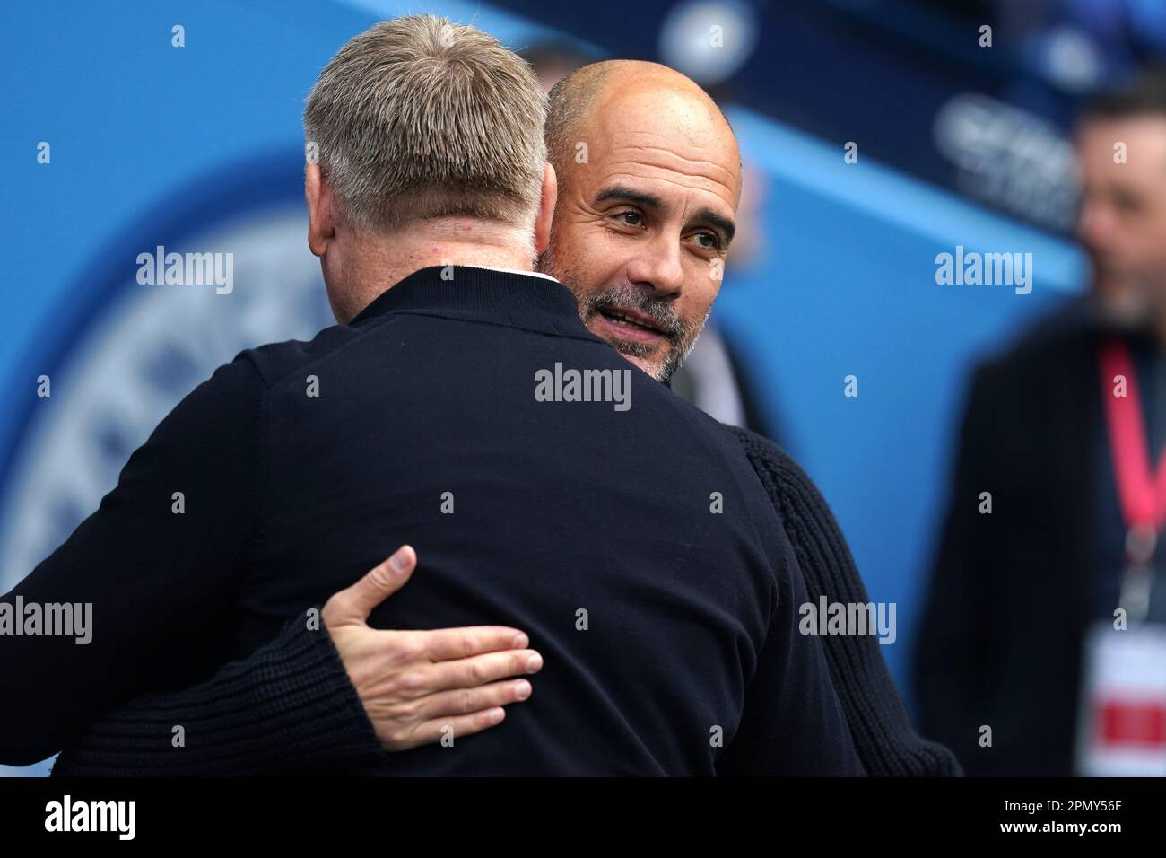 Manchester City manager Pep Guardiola (right) greets Leicester City ...