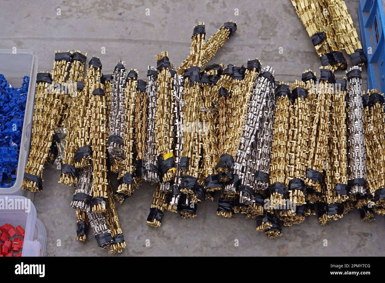 Many golden crimp spade connectors parts in bunch Stock Photo Alamy