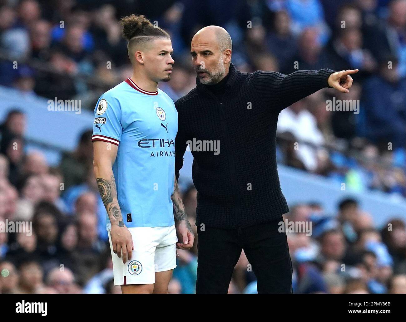 Manchester City Manager Pep Guardiola (right) Speaks To Kalvin Phillips ...