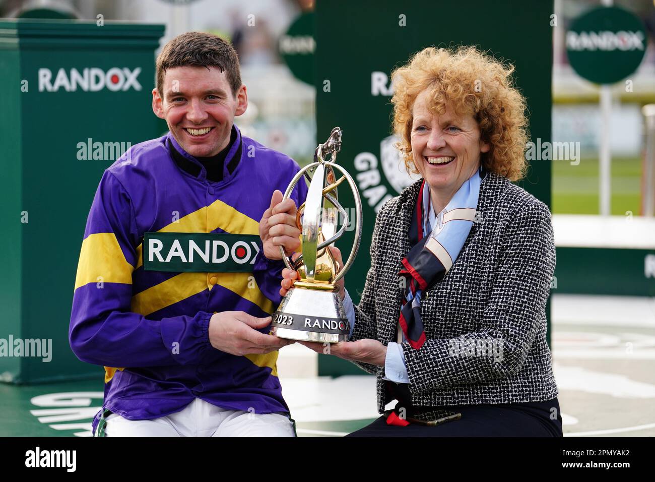 Jockey Derek Fox and trainer Lucinda Russell after winning the Randox Grand National Handicap Chase with Corach Rambler on day three of the Randox Grand National Festival at Aintree Racecourse, Liverpool. Picture date: Saturday April 15, 2023. Stock Photo