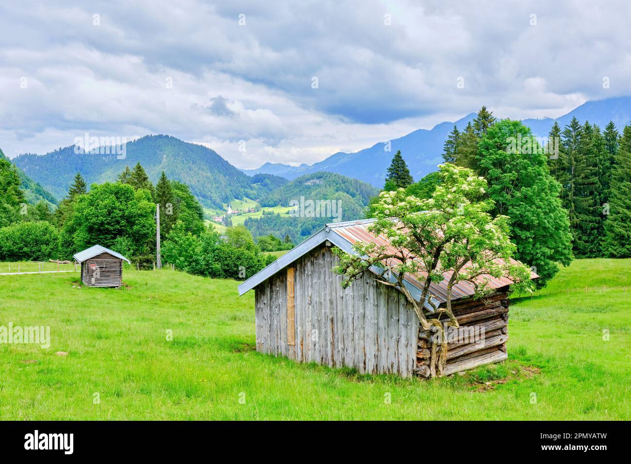 Small alpine shed as a shelter for grazing animals in a mountain setting in the Allgaeu Alps near Oberstdorf in Bavaria, Germany. Stock Photo
