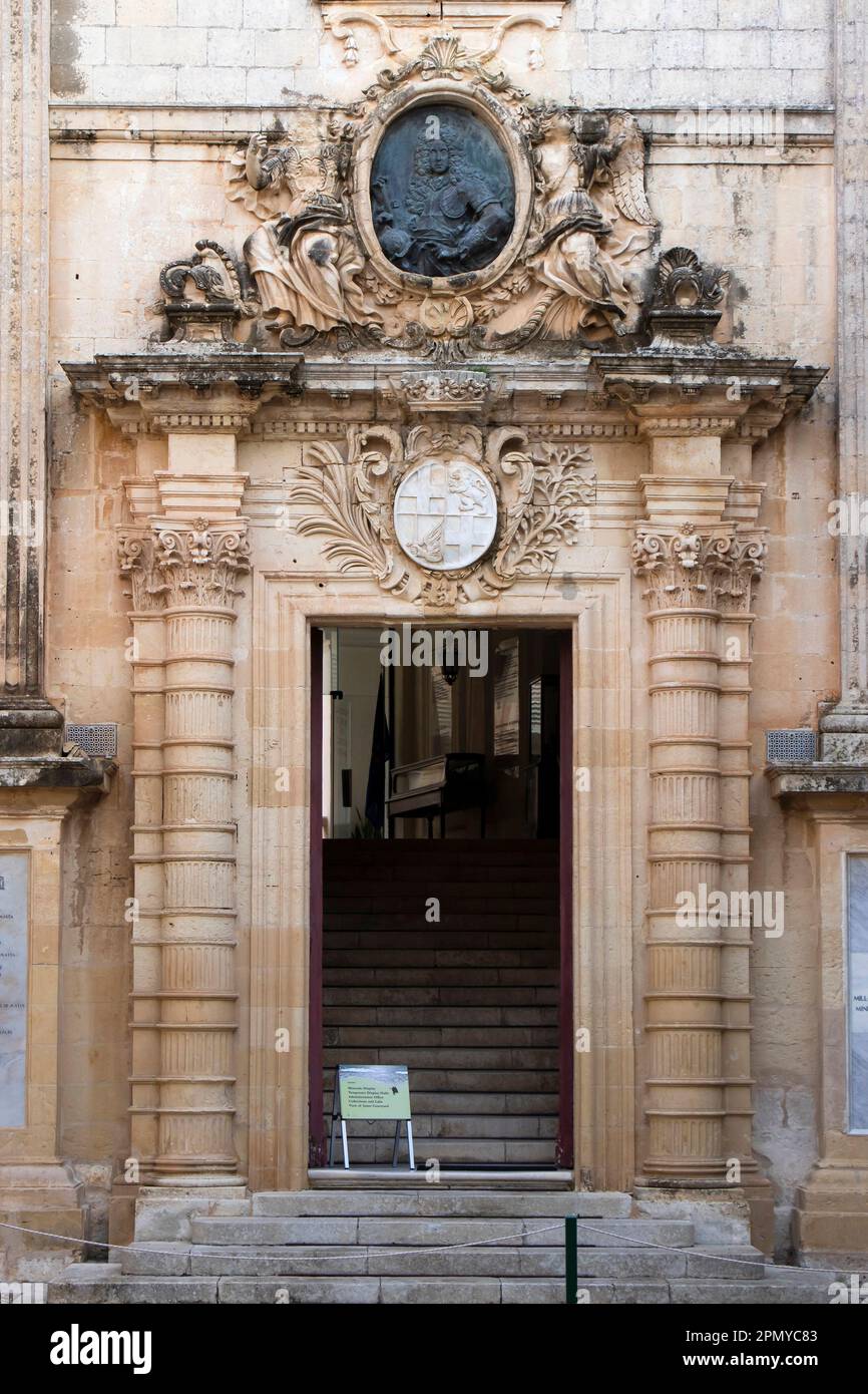 Mdina, Malta - November 13, 2022: National Museum of Natural History, an 18th-century Parisian baroque style palace, entrance with the coat of arms Stock Photo