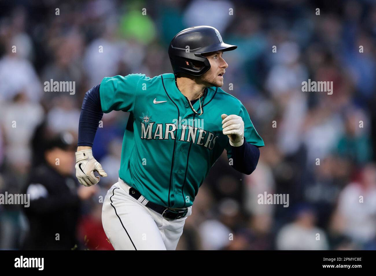 Seattle Mariners left fielder Jarred Kelenic watches the flight of his