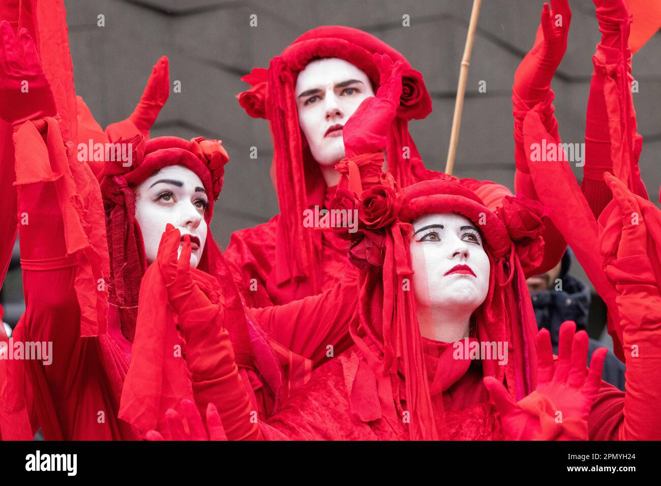 Red Rebel brigade at the Extinction Rebellion protest Berlin 15 April 2023. Protesters, including members of Extinction Rebellion, marched from the Bayer AG Pharmaceuticals centre ( North East central Berlin) to the Federal Ministry of Food and Agriculture in central Berlin. Outside the Ministry a 'die in', of  protesters dressed as animals, took place and saw the arrival of the 'Red Rebel Brigade' from Extinction Rebellion. Berlin Germany. Picture credit garyroberts/worldwidefeatures.com April 2023. Protesters, including members of Extinction Rebellion, marched from the Bayer AG Pharmaceutica Stock Photo