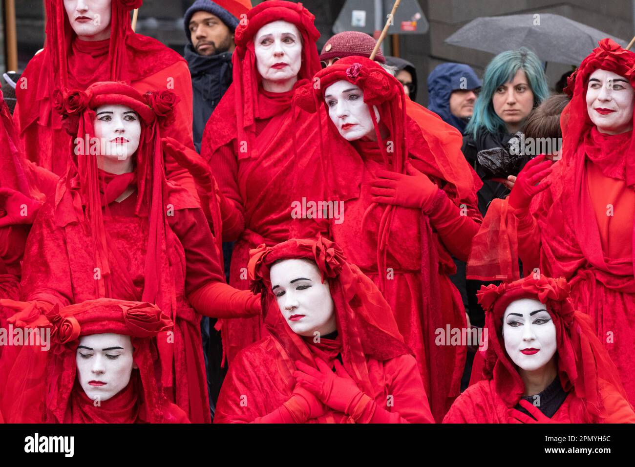 Red Rebel brigade at the Extinction Rebellion protest Berlin 15 April 2023. Protesters, including members of Extinction Rebellion, marched from the Bayer AG Pharmaceuticals centre ( North East central Berlin) to the Federal Ministry of Food and Agriculture in central Berlin. Outside the Ministry a 'die in', of  protesters dressed as animals, took place and saw the arrival of the 'Red Rebel Brigade' from Extinction Rebellion. Berlin Germany. Picture credit garyroberts/worldwidefeatures.com April 2023. Protesters, including members of Extinction Rebellion, marched from the Bayer AG Pharmaceutica Stock Photo