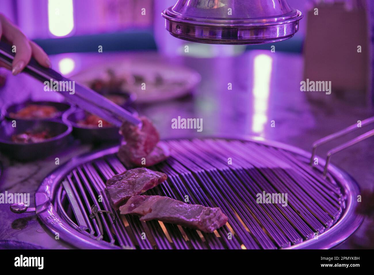 Sizzling Korean BBQ closeup in the restaurant Stock Photo Alamy