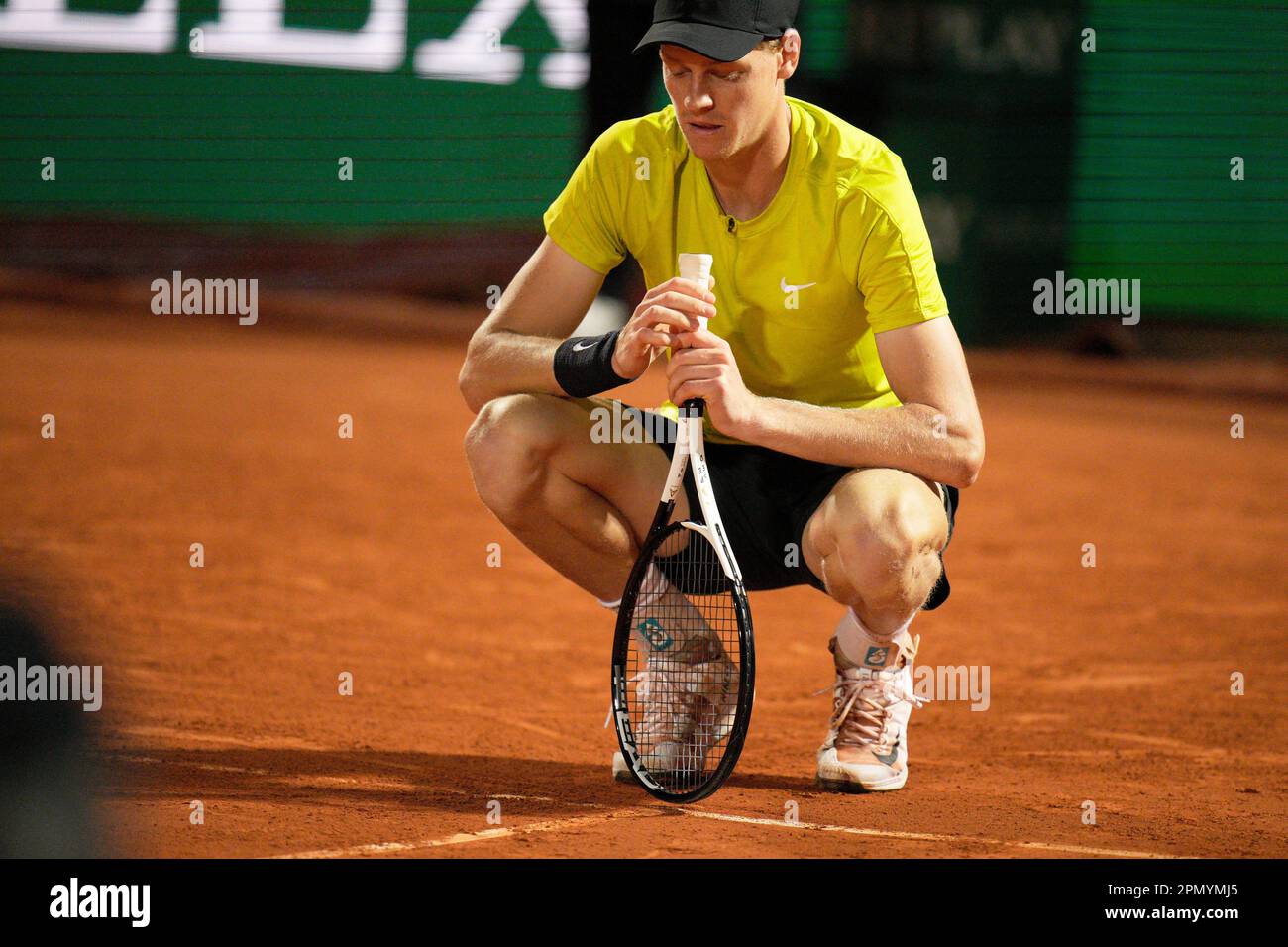 Jannik Sinner, of Italy, looks at a ball mark during his Monte Carlo Tennis Masters semifinals match with Holger Rune, of Denmark, in Monaco, Saturday, April 15, 2023