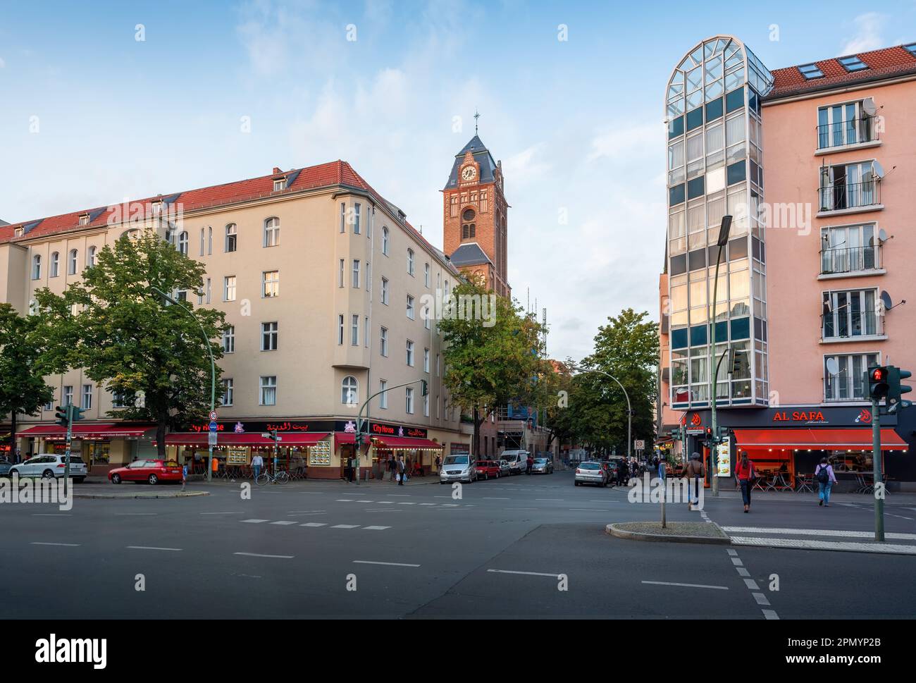Sonnenallee Street and Martin Luther Church Tower at Neukolln - Berlin, Germany Stock Photo