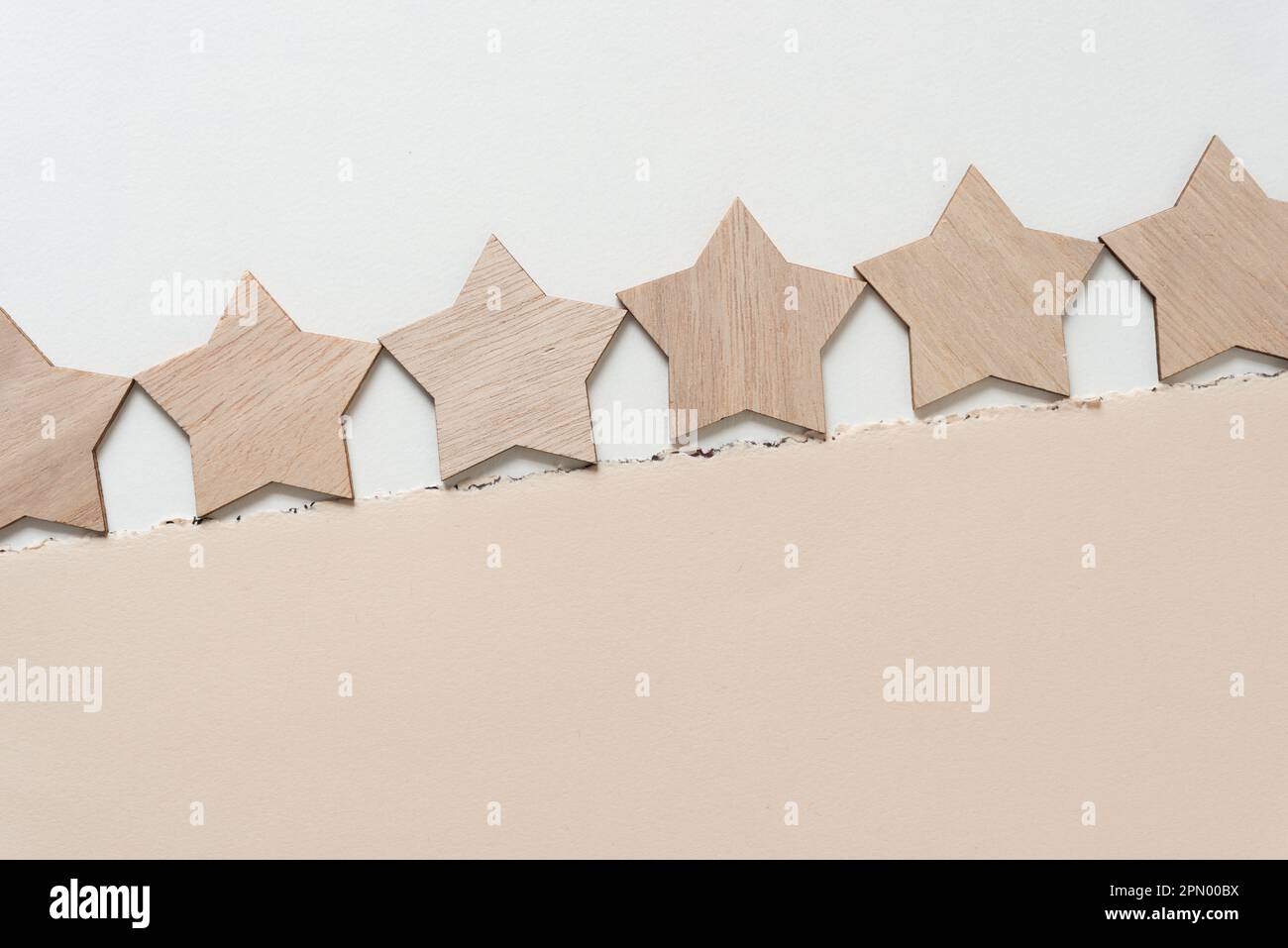 wood stars and old art paper with deckle edge Stock Photo Alamy