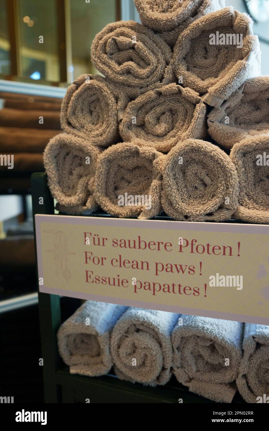 Clean white towels arranged on shelf at luxury hotel Stock Photo Alamy