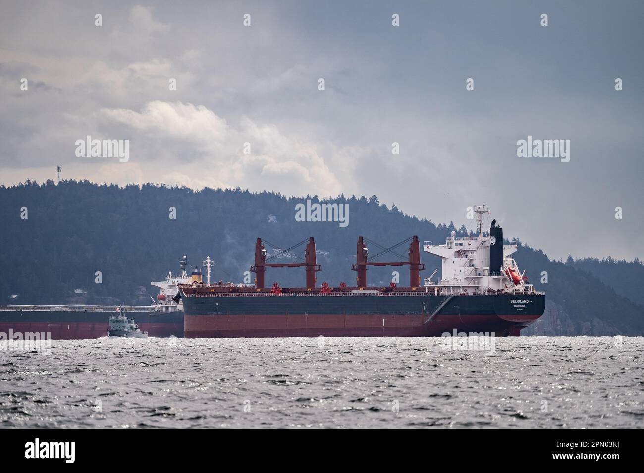 Ultramax bulk carrier Belisland and another cargo ship anchored in