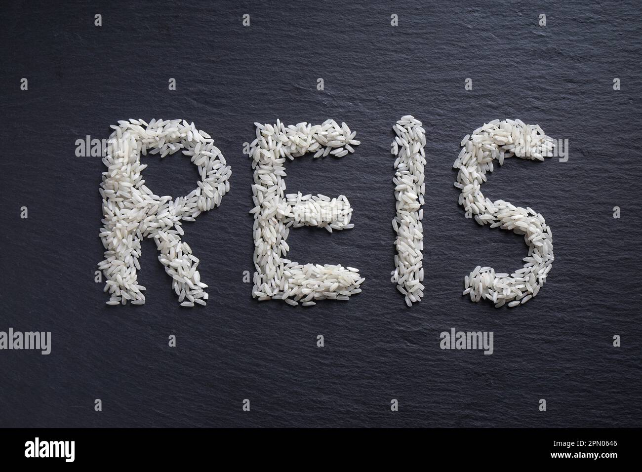 Rice grains form the word rice into letters Stock Photo Alamy