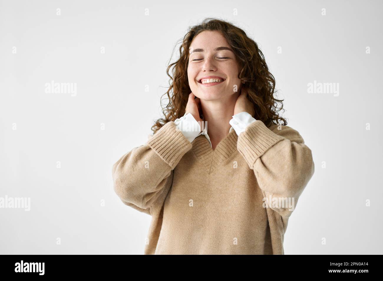 Young smiling woman laughing standing isolated at white background ...