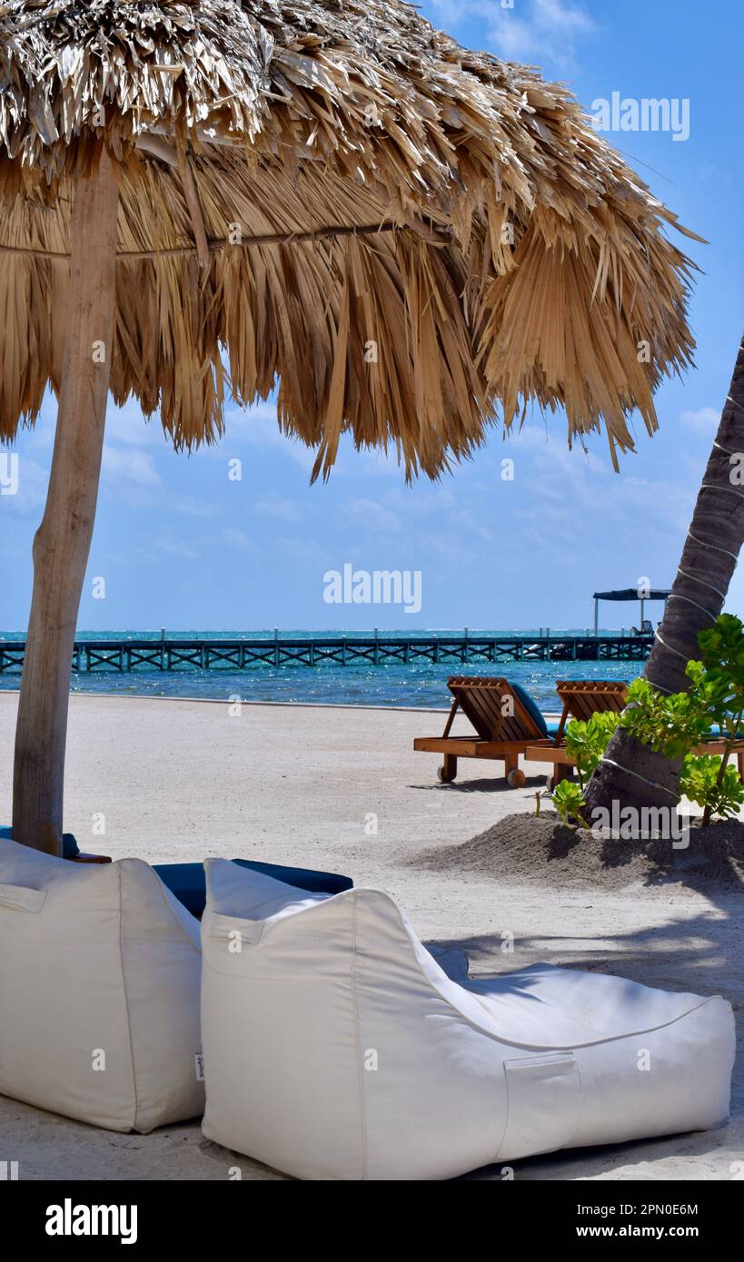 Seating at the beach for some rest and relaxation, on a sunny day in San Pedro, Ambergris Caye, Belize, Caribbean/Central America. Stock Photo