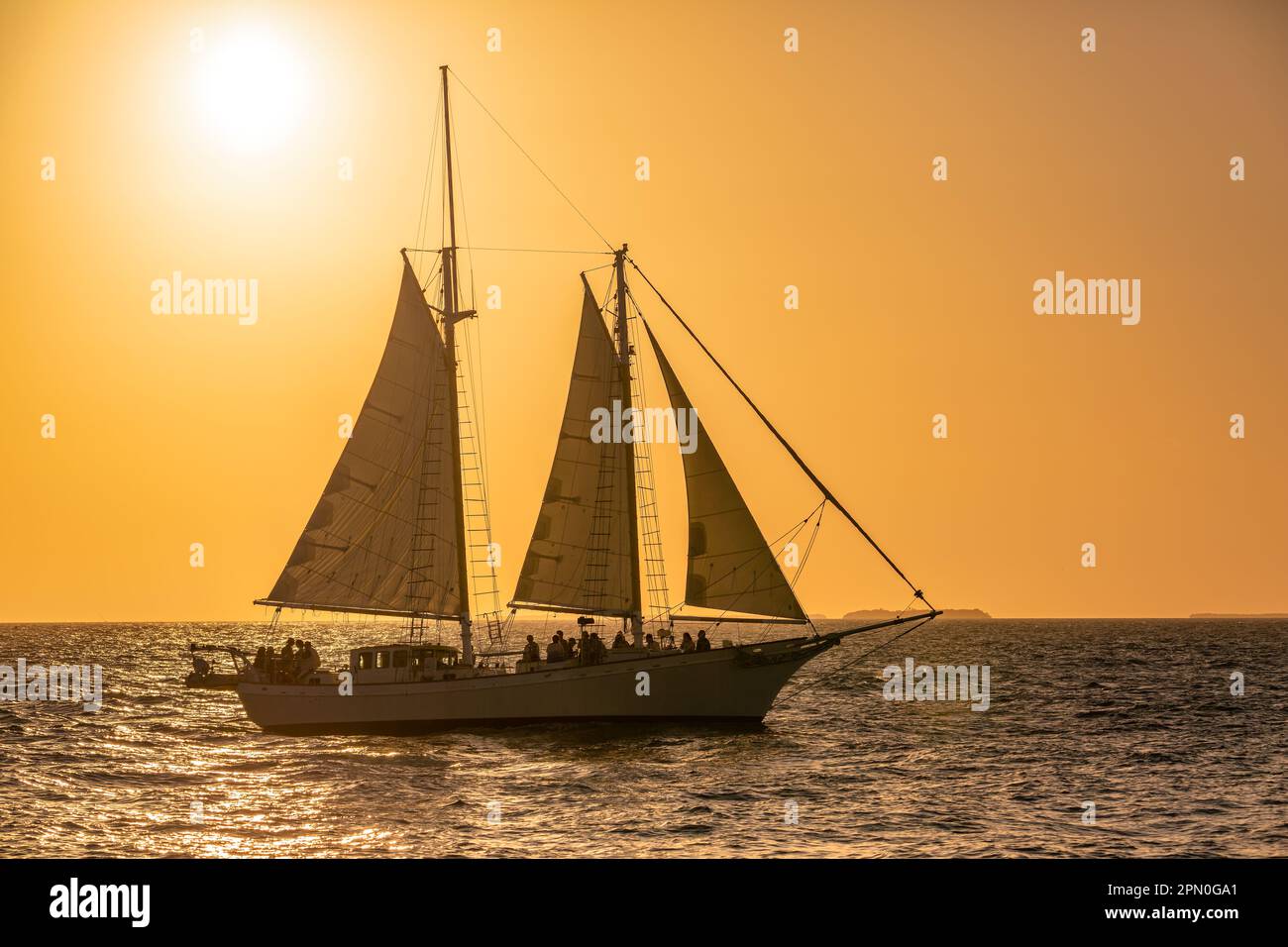 Sailboat at sunset in Key West, Florida. Stock Photo