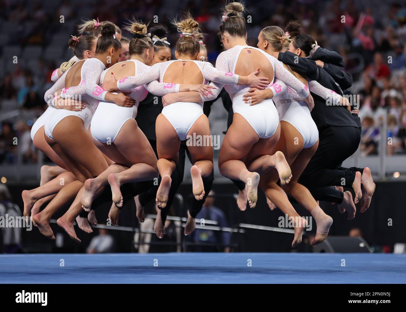 Fort Worth, TX, USA. 15th Apr, 2023. The Utah gymnastics team huddles