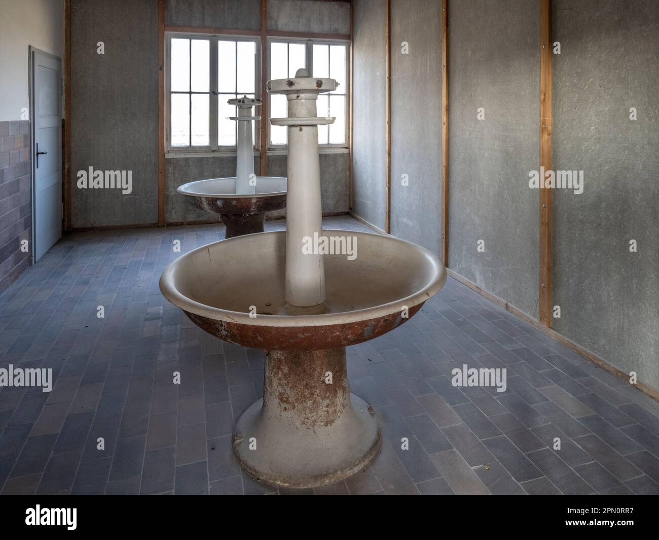 wash room inside the barracks at the Dachau Concentration Camp Stock Photo