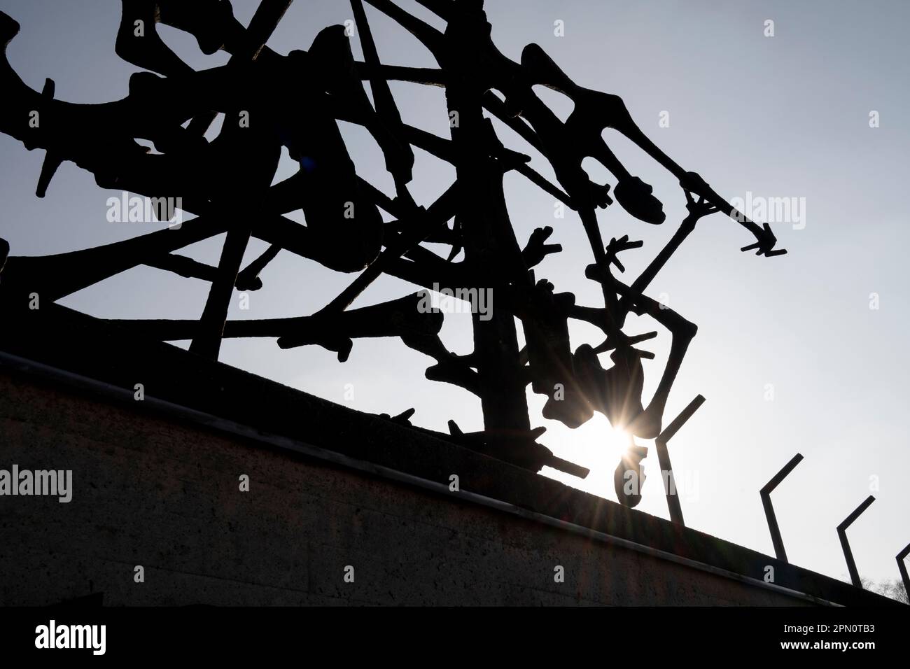 Memorial Sculpure at Dachau memorializing the Holocaust victims, done by the artist Nandor Glid who was a Holocaust survivor. Stock Photo