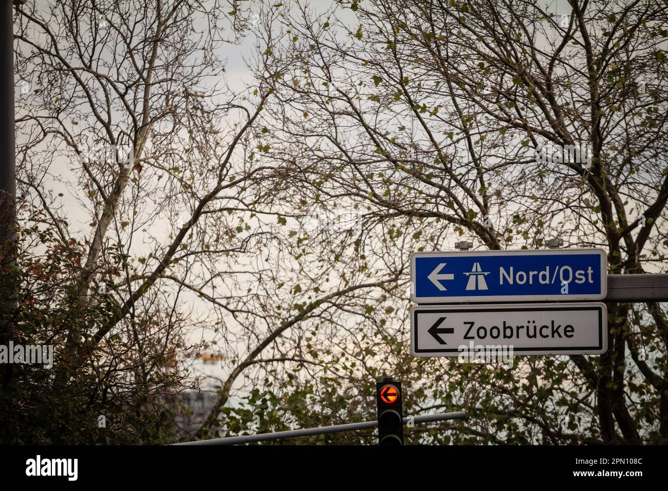 Picture of a german roadsign indicating various directions, notably the