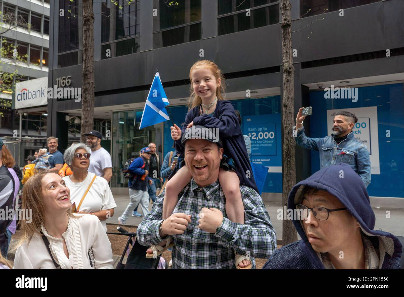 New York, New York, USA. 15th Apr, 2023. (NEW) 25th Annual New York City Tartan Day Parade. April 15, 2023, New York, New York, USA: 5 years old Teigen holding a Scottish flag cheers on participants at the 25th Annual Tartan Day Parade in Manhattan on April 15, 2023 in New York City. (Credit Image: © M10s/TheNEWS2 via ZUMA Press Wire) EDITORIAL USAGE ONLY! Not for Commercial USAGE! Stock Photo