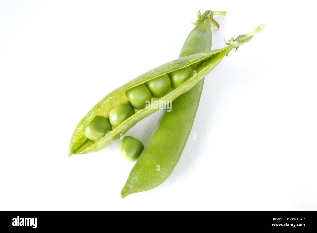 Green peas isolated on white Stock Photo