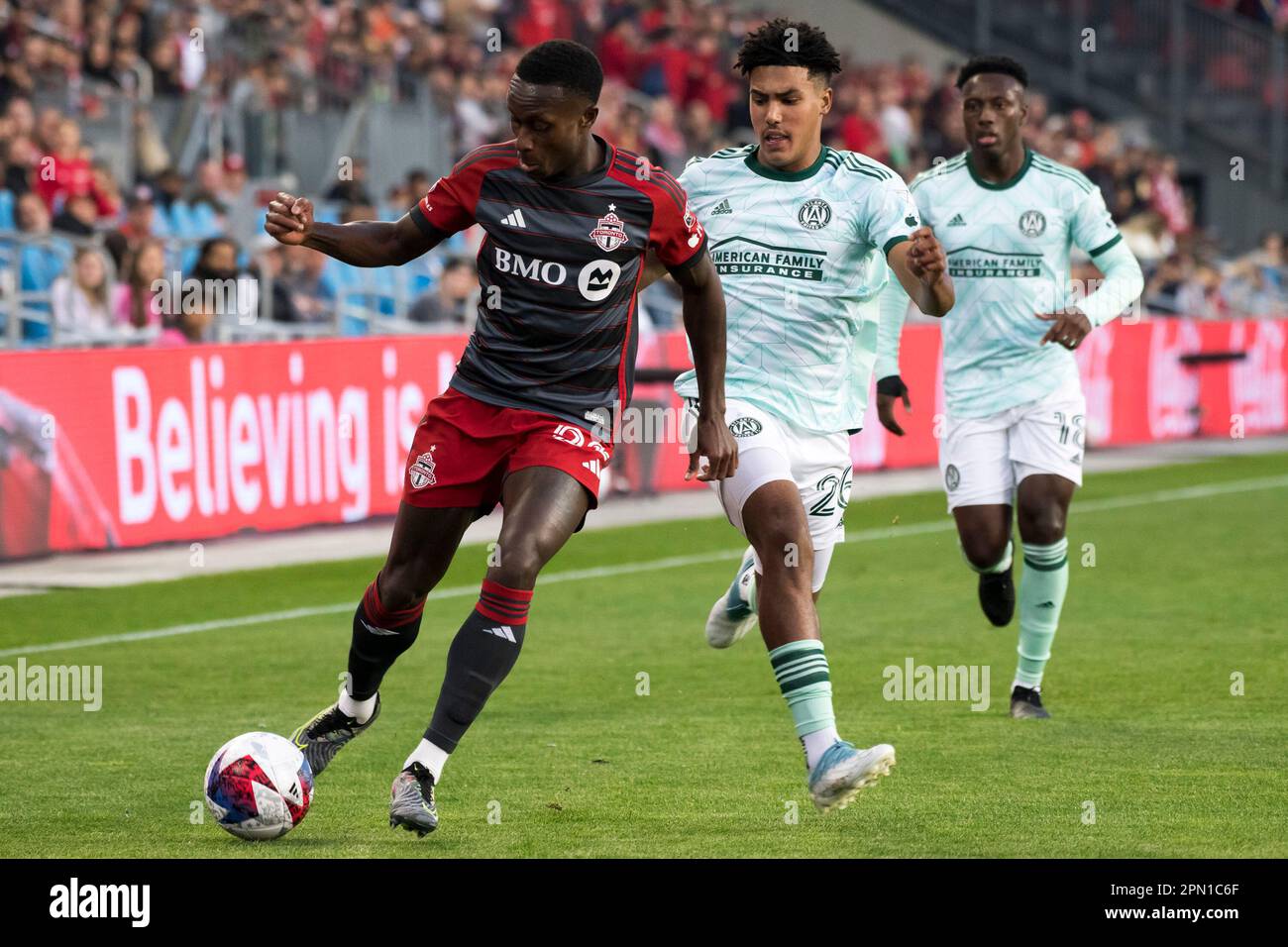 Toronto, Canada. 15th Apr, 2023. Richie Laryea #22 (L) and Caleb Wiley #26 (R) in action during the MLS game between Toronto FC and Atlanta United at BMO field. The game ended 2-2. Credit: SOPA Images Limited/Alamy Live News Stock Photo