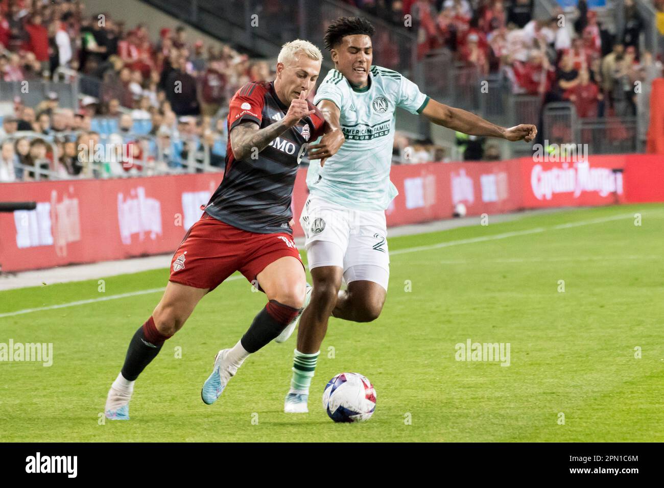 Toronto, Canada. 15th Apr, 2023. Federico Bernardeschi #10 (L) and Caleb Wiley #26 (R) in action during the MLS game between Toronto FC and Atlanta United at BMO field. The game ended 2-2. Credit: SOPA Images Limited/Alamy Live News Stock Photo