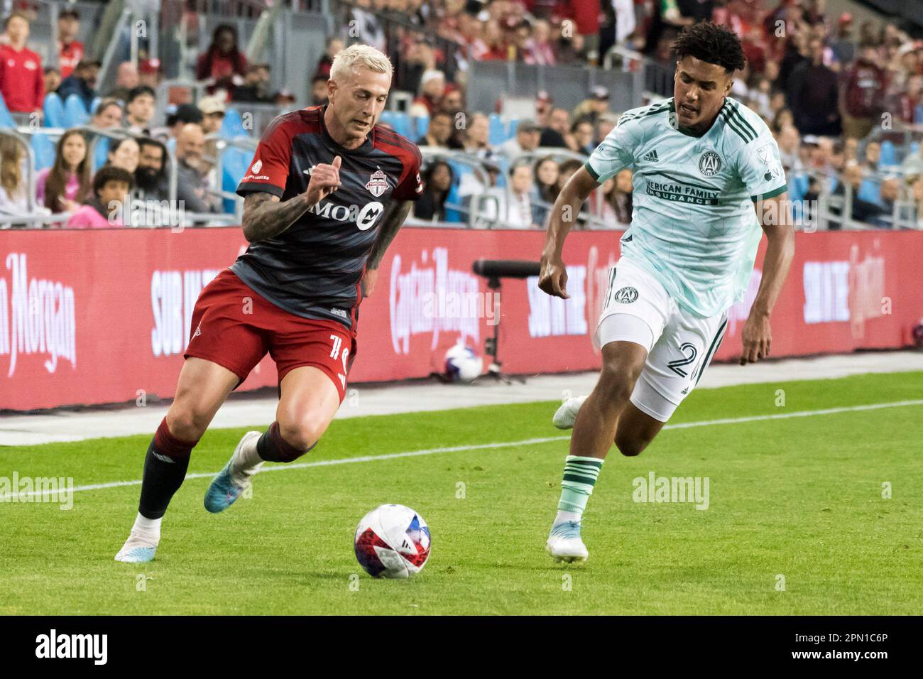 Toronto, Canada. 15th Apr, 2023. Federico Bernardeschi #10 (L) and Caleb Wiley #26 (R) in action during the MLS game between Toronto FC and Atlanta United at BMO field. The game ended 2-2. Credit: SOPA Images Limited/Alamy Live News Stock Photo