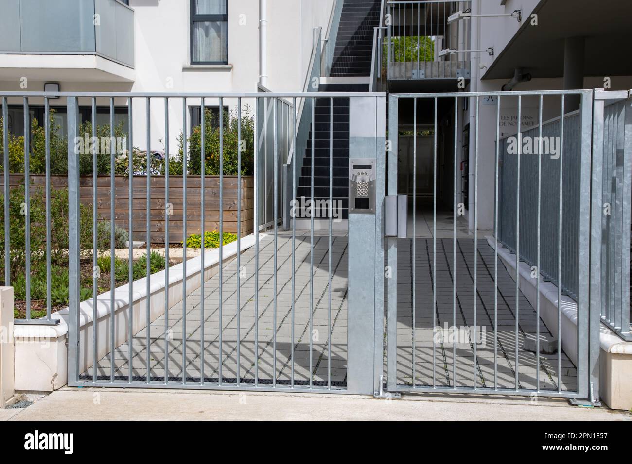 classical gate and entrance door to the building and access to the