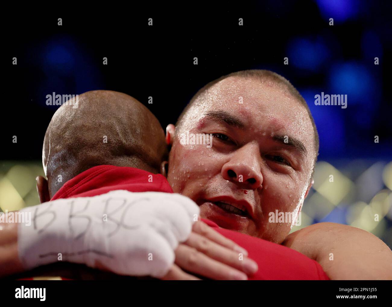 London, Britain. 15th Apr, 2023. Zhang Zhilei (R) of China celebrates ...