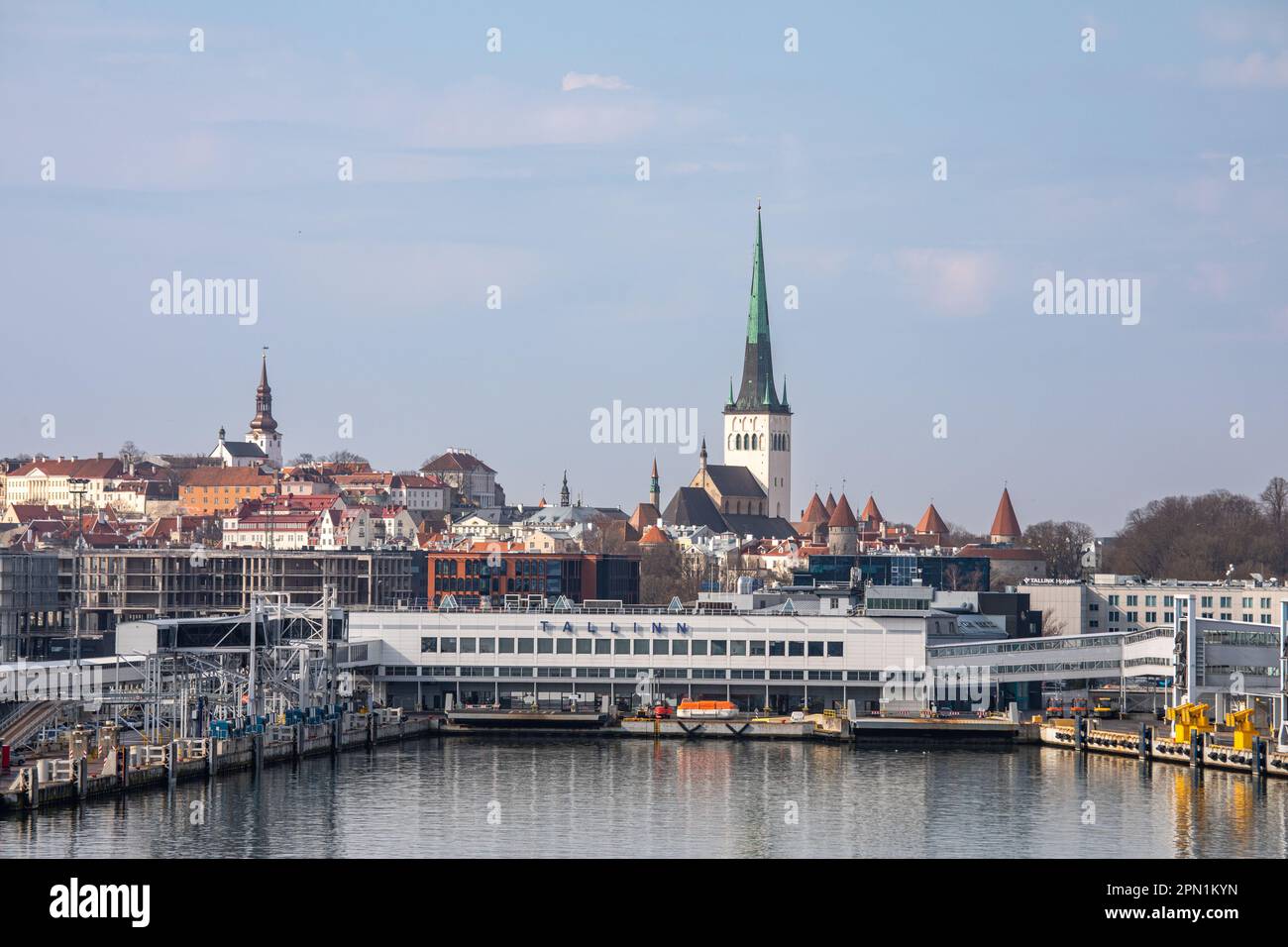 Tallinn Sadam passenger harbor terminal with old town belfries and turrets in the background in Tallinn, Estonia Stock Photo