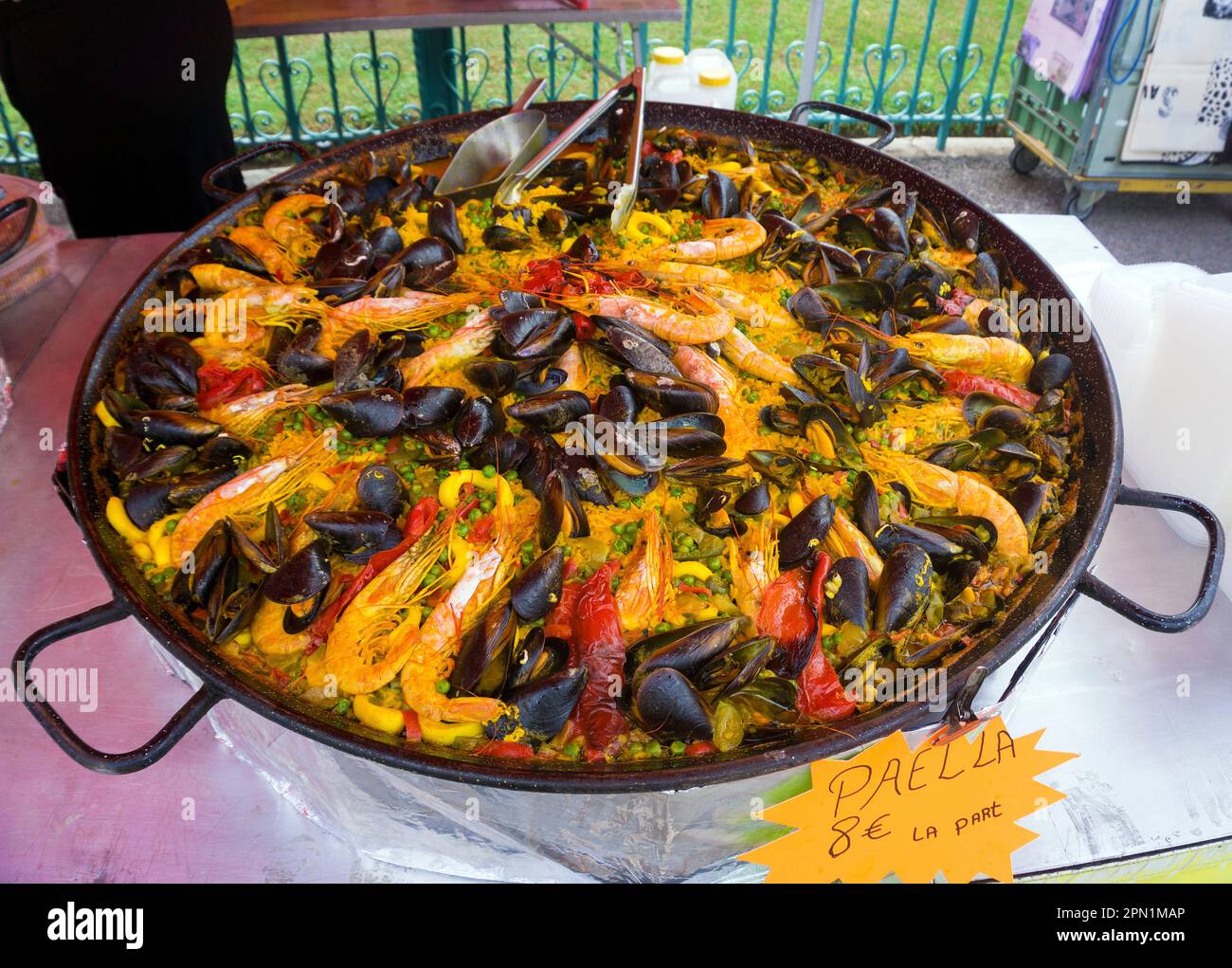 Fresh Paella at a market stall, weekly market in Port Vendres, Pyrénées-Orientales, Languedoc-Roussillon, South France, France, Europe Stock Photo