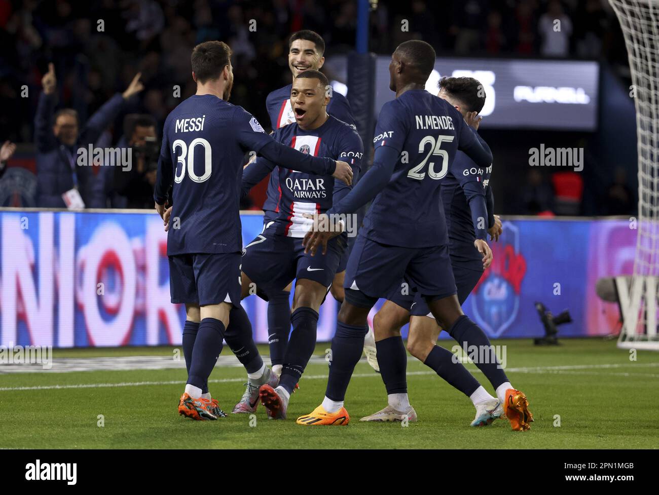 Kylian Mbappe of PSG and teammates celebrate the goal of Lionel Messi #30  (left) during the French championship Ligue 1 football match between Paris  Saint-Germain and RC Lens on April 15, 2023