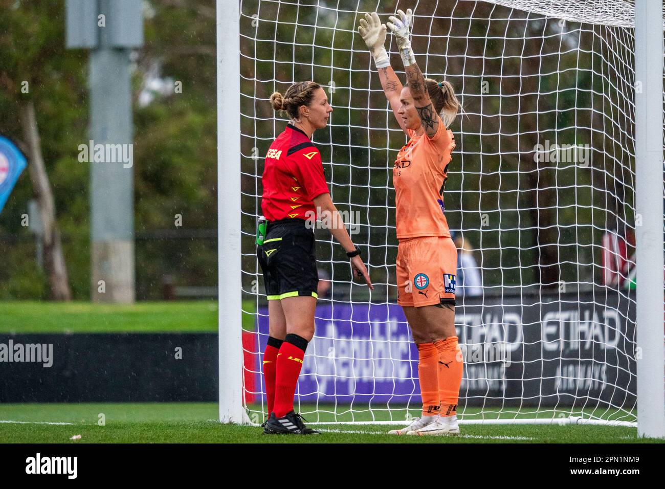 Cranbourne East, Australia. 15 April 2023. The match referee reminds Melbourne City keeper Melissa Barbieri (#23) to stay behind the line as the penalty kick is taken. Credit: James Forrester/Alamy Live News Stock Photo