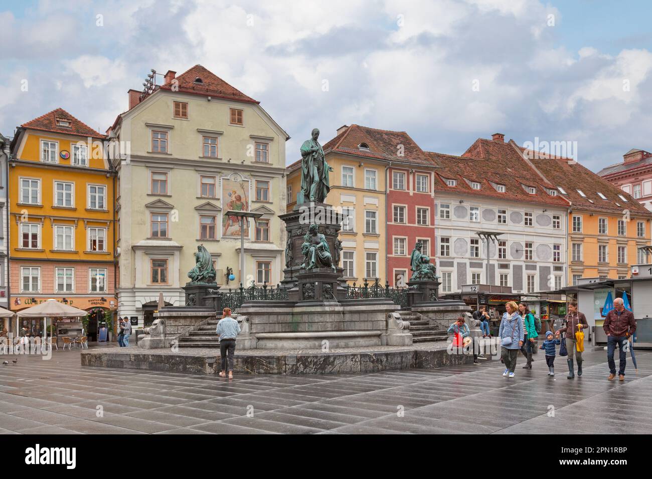 Graz, Austria - May 28 2019: The Erzherzog-Johann-Brunnen (English: Archduke Johann Fountain) in the middle of Hauptplatz (English: Main Square), oppo Stock Photo