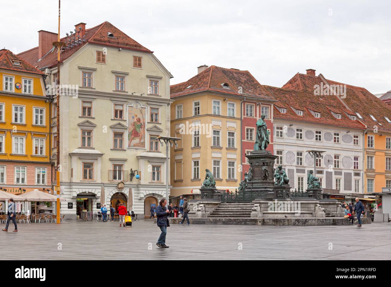 Graz, Austria - May 28 2019: The Erzherzog-Johann-Brunnen (English: Archduke Johann Fountain ) in the middle of Hauptplatz (English: Main Square), opp Stock Photo