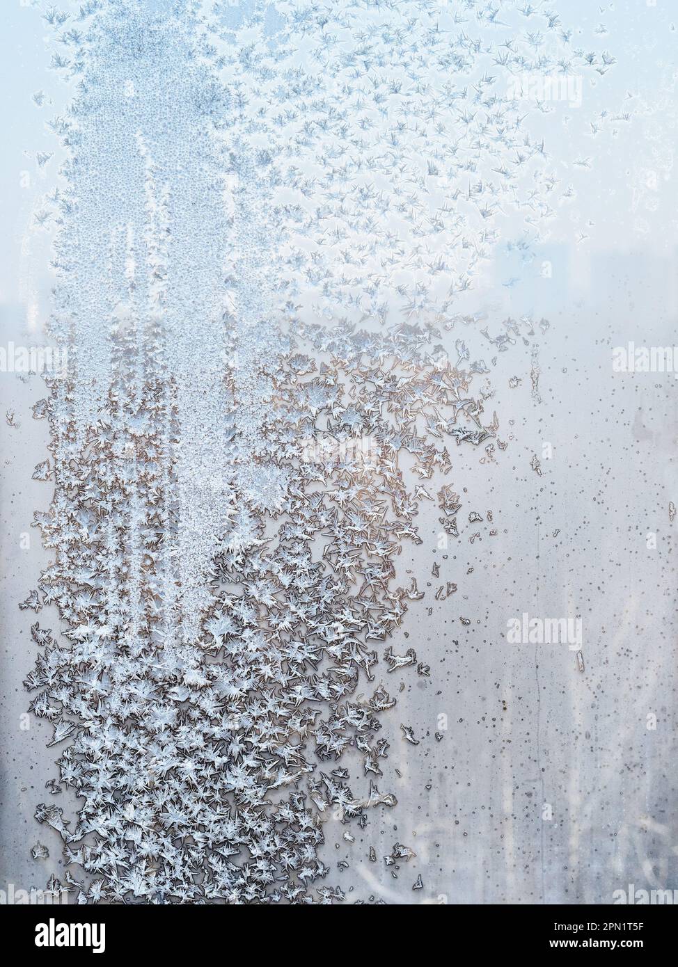 frozen home window pane on cold winter day Stock Photo