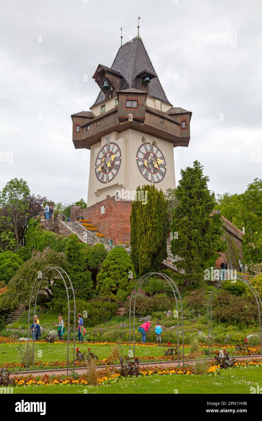 Graz, Austria - May 28 2019: The Clock Tower (German: Uhrturm) is a recognisable icon for the city, and is unusual in that the clock's hands have oppo Stock Photo