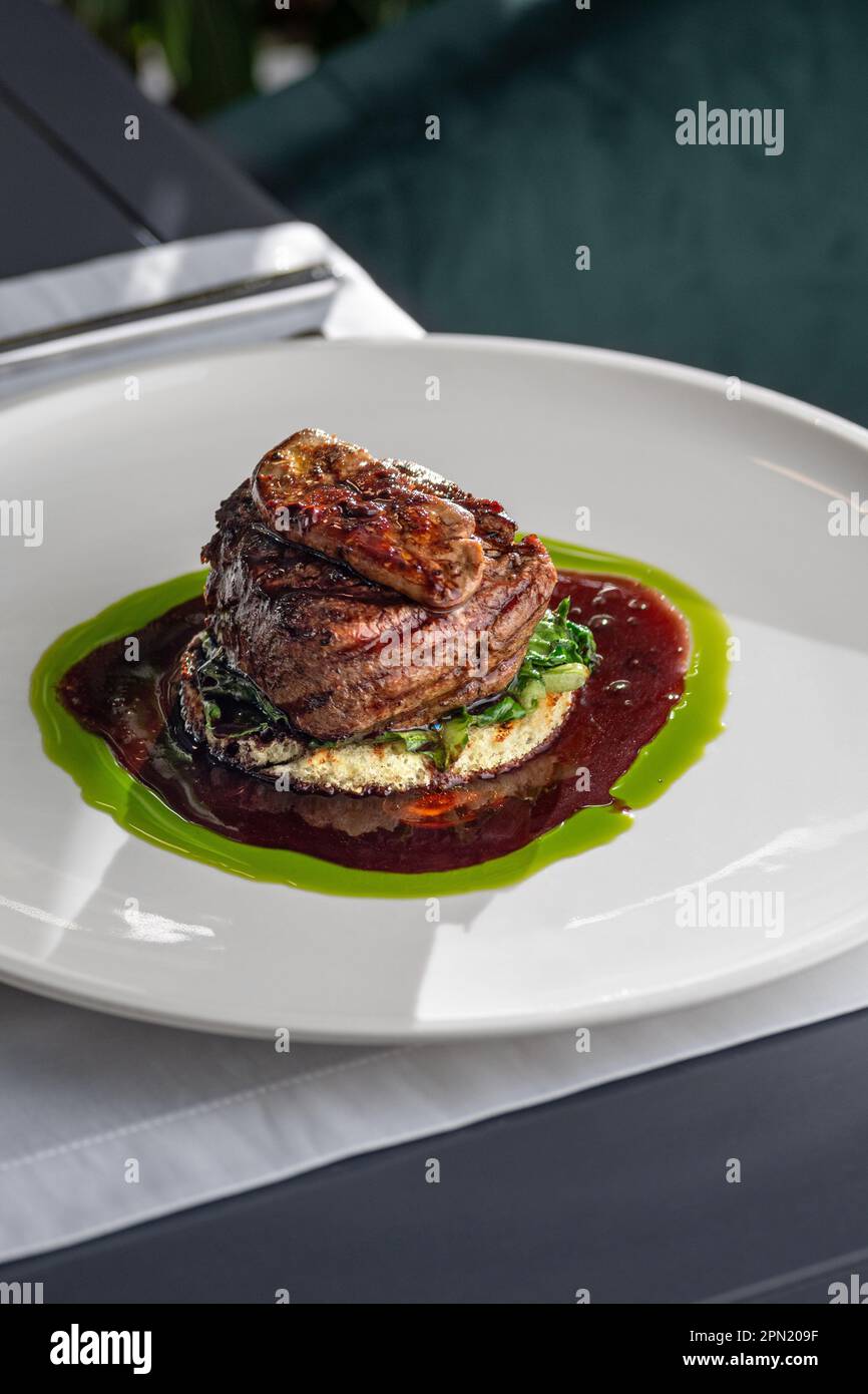 Tournedos Rossini. Foie gras, Black Angus beef tenderloin, with red wine sauce. Fillet mignon