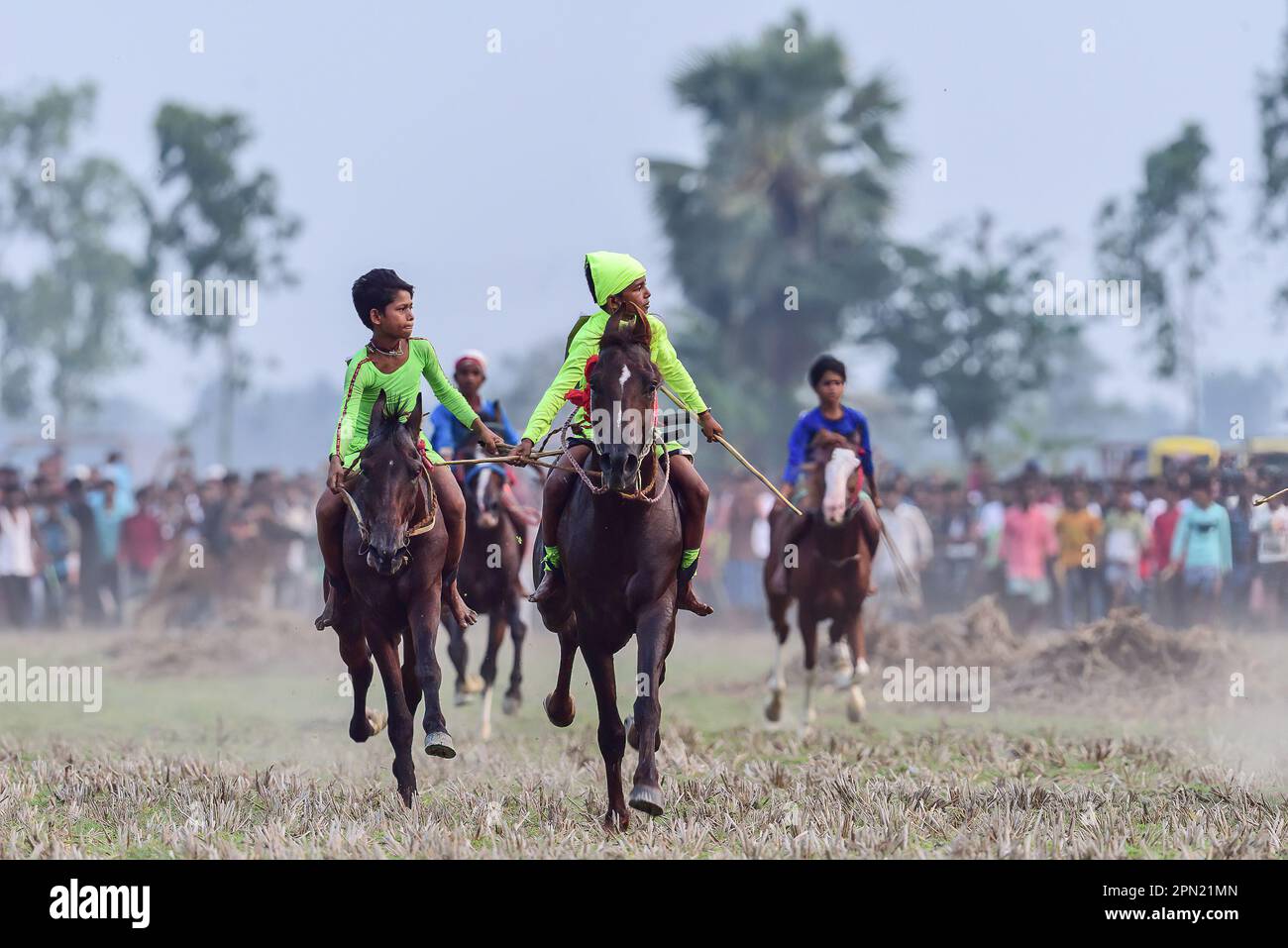 Basanti, India. 15th Apr, 2023. Children Jockeys ride their horses