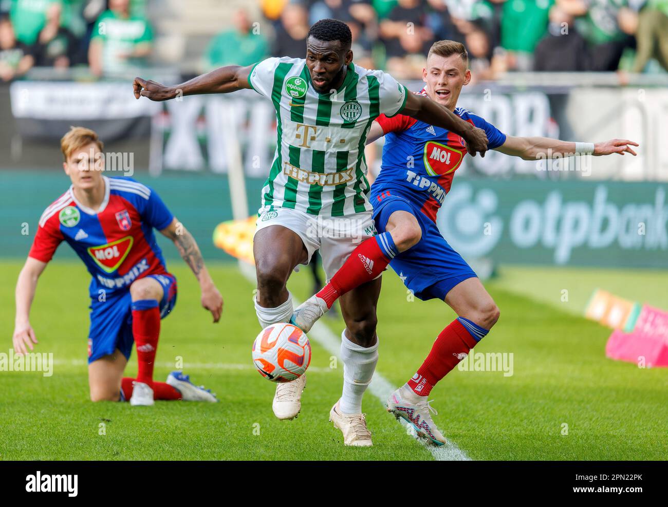 Palko Dardai of MOL Fehervar FC challenges Anderson Esiti of