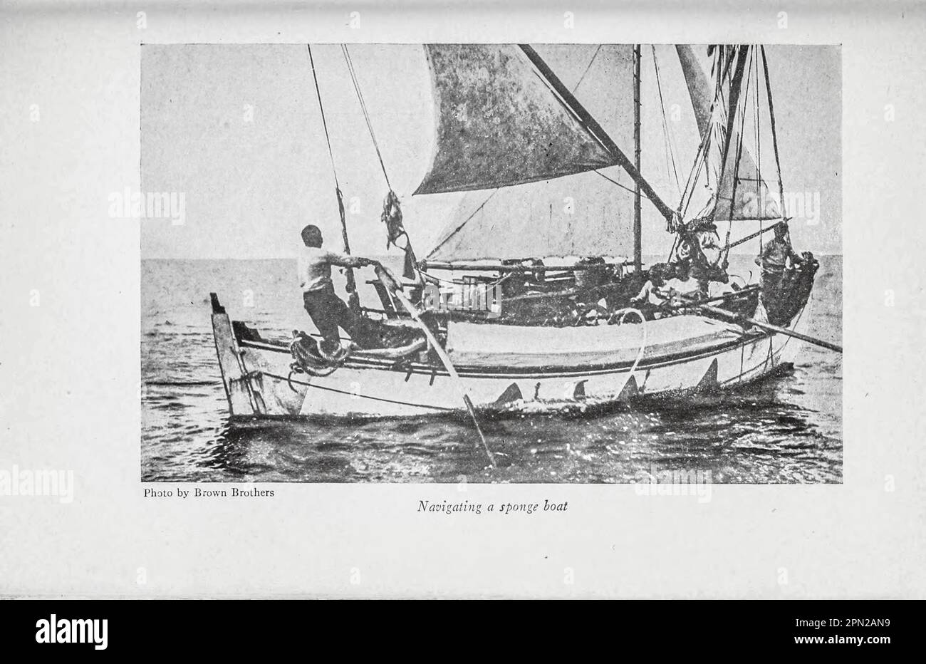 Navigating a Sponge Boat from the book ' Highways and byways of Florida; human interest information for travellers in Florida ' by Clifton Johnson, 1865-1940 Publication date 1918 Publisher New York, The Macmillan company; Stock Photo