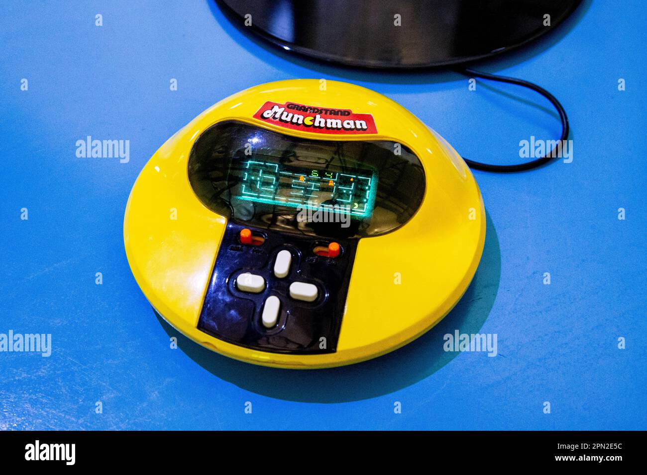 Grandstand Munchman retro 1980s hand held Pac Man game device, Centre for Computing History, Cambridge, UK Stock Photo