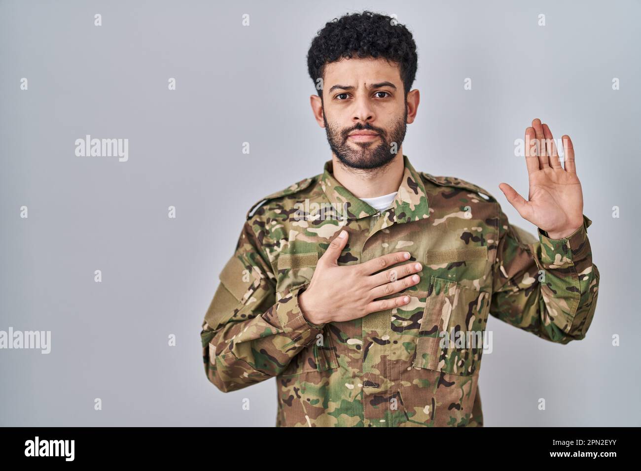 Proud man in military suit Stock Photo - Alamy