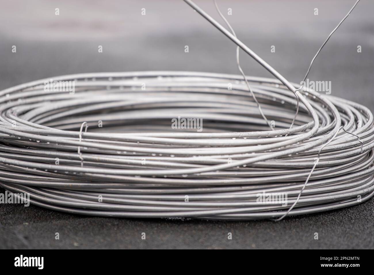 Thick aluminum wire for grounding buildings. Grounding wire to protect